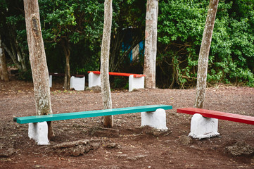 colorful benches at a tropical park/playground