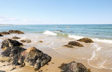 Ogunquit Beach on a Sunny Afternoon, Ogunquit, Maine, USA. Ogunquit was named by the Abenaki tribe, because the word means a beautiful place by the sea.