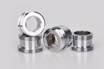 Set of fittings and connections for water pipes on a white background