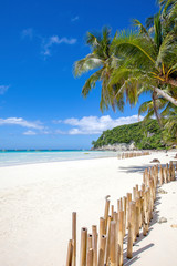 white beach and bamboos on Boracay island, Philippines.