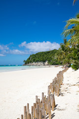 white beach and bamboos on Boracay island, Philippines.