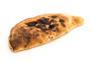 Baked in calzone - closed type of pizza which is folded in half