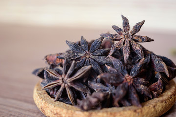 Badian fruit on a wooden table top.