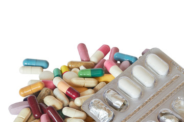 Concept of treatment, options for forms of pharmacological preparations, backdrop of multicolored medicine pills and capsules and blister with pills.
