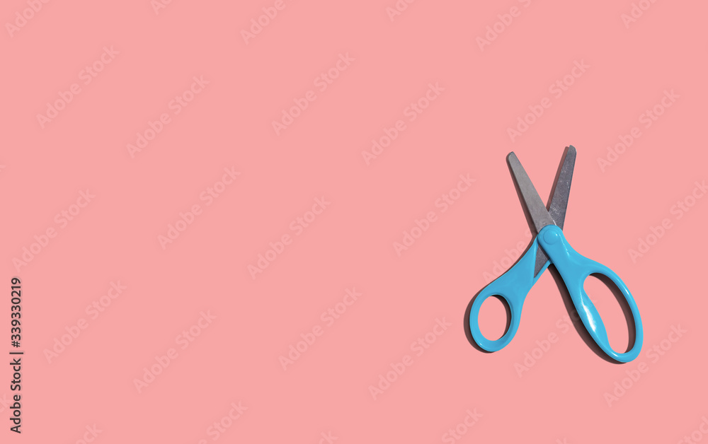 Poster scissors with dropped shadow from above - overhead view