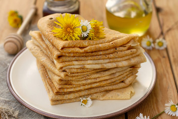 Thin French pancakes crepes served with honey