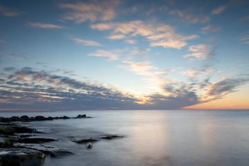 Fototapeta na wymiar Cloudy sunset over the Baltic Sea at island of Gotland, Sweden