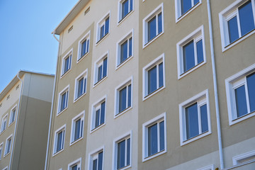 facade of a new multi-storey building with many windows