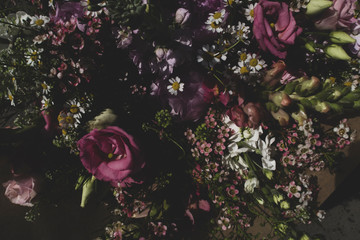 Colorful mixed bouquet with various spring flowers. Mixed flower arrangement: various flowers in...