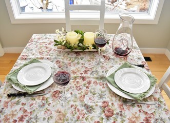 Holiday Spring Easter Table setting with beautiful table centrepiece for celebration meal