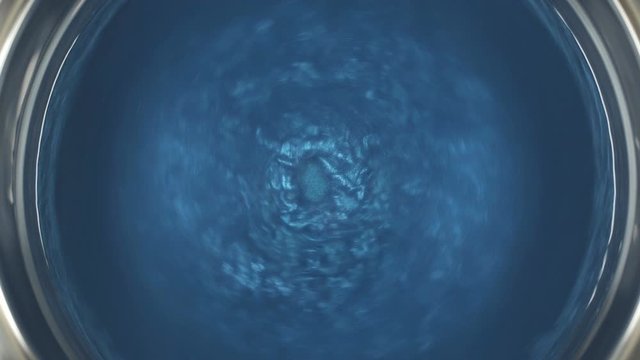 Rheoscopic fluid. Beautiful movement of particles in a liquid. Fantastic patterns and shapes.