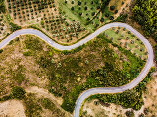 Tuscan countryside road, local beautiful scenic route, photo from above.