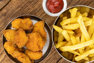 Homemade Chicken Nuggets on vintage background