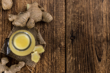 Portion of Ginger Juice as detailed close-up shot; selective focus