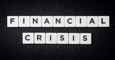 Financial crisis, black letters on white cubes
