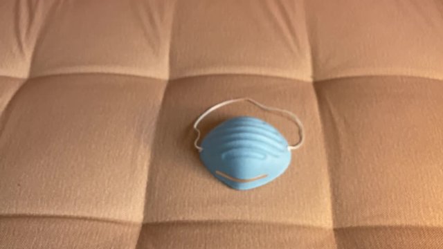 Medical mask for protection against coronavirus. Taking care of your health and those around you. Means of hygiene and prevention