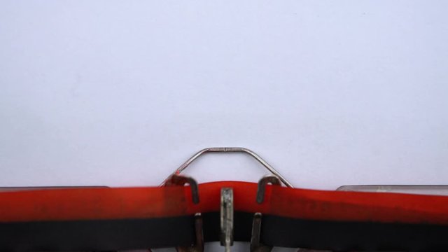 Parole decision - phrase printed on an old typewriter in red letters, close up. vintage inscription