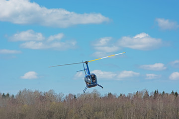 Fototapeta na wymiar helicopters Robinson R44