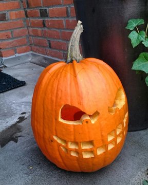 Jack O Lantern In Porch During Halloween