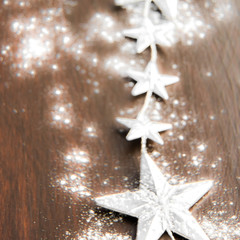 Christmas, Xmas - Snowflakes and Silver Star blurred in snowing background
