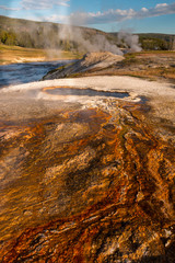 South Scalloped Spring And The Firehole River, Upper Geyser Basin Trail. Yellowstone National Park, Wyoming , USA