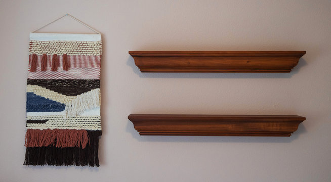 general view of room shelf and decorations in a house