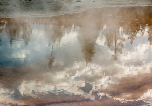 Early Morning Reflections In Chromatic Pool, Upper Geyser Basin, Yellowstone National Park, Wyoming, USA © Billy McDonald