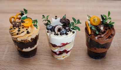 Very beautiful and appetizing traily closeup on table with space for signatures. Cake