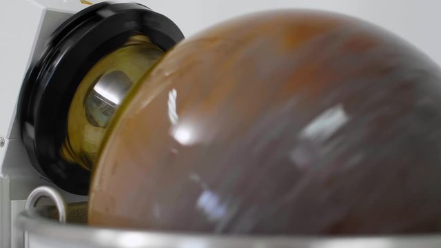 Close up of rotational vaporiser during CBDa oil extraction