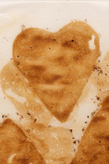 Abstract background white dirty used baking paper. Aged paper texture with hearts and stars