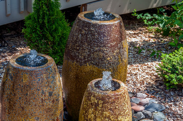 three fountains spurting water