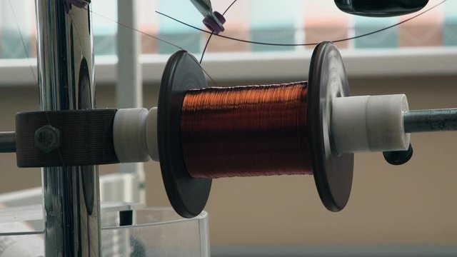 Coil With Metal Wire Metal Rolling Machine in Factory of Precious Metal Production Close Up