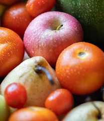 Mix fresh fruits on the table close up view. Selective focus.