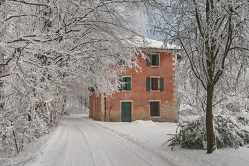 Red house in snow