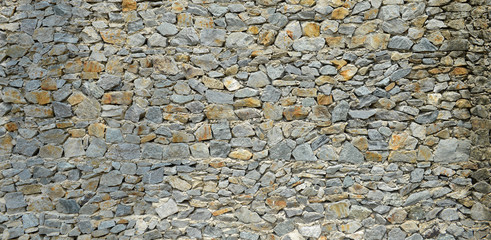 Stone background, texture of stone grey brick wall