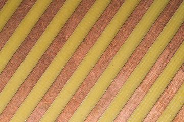 Parallel copper tracks on circuit board close up. industrial background