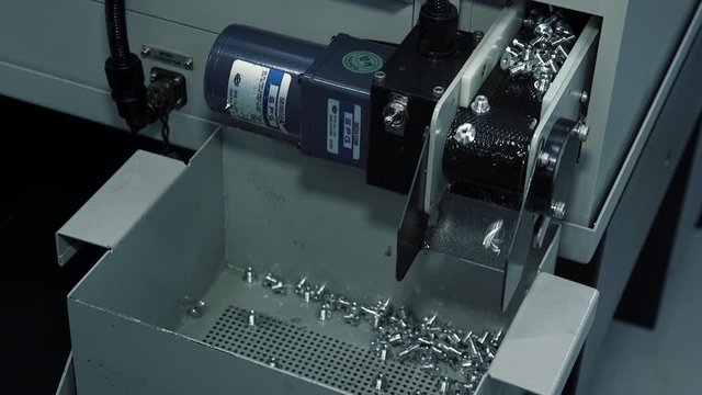  Industrial Robot Conveyor Work Process Close Up Automated Line grommet screw