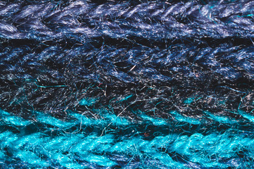 Blue fabric texture. knitted textile background. woven material close up