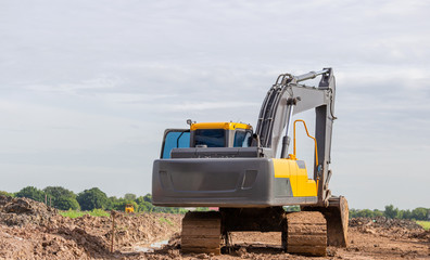 Backhoes Excavator machine at a Construction Site