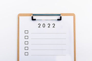 wooden clipboard with pen