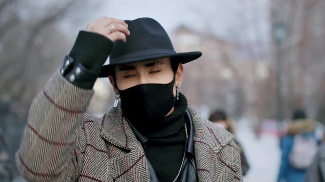 Asian Handsome Fashion Guy. Wear Black Stylish Respiratory Mask Cool-look Korea. Chinese People. Coronavirus Hipster Style China. Covid-19. Corona Virus Asia. Serious Face Man Young Adult Korean Model