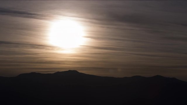 A long-lens timelapse of the sun setting behind the Panamint Range.