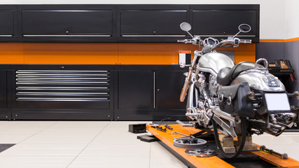 Photo of a motorcycle service garage. Workshop. © Stavros