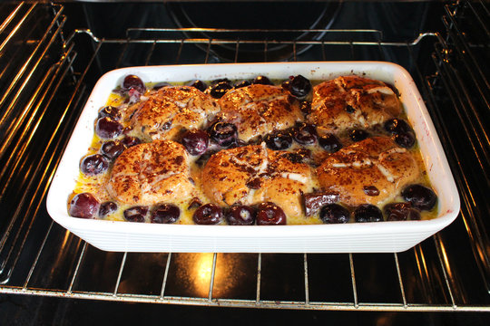 Hot Cross Bun Pudding With Cherry And Dark Chocolate.