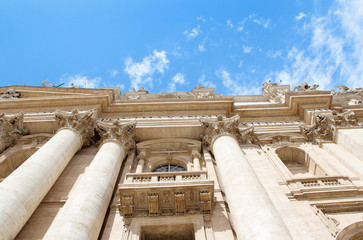 Facade decoration with big column and sculptures of St. Peter's Basilica in Vatican City, Rome,...