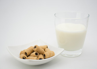 Plain yogurt with chocolate cereal.