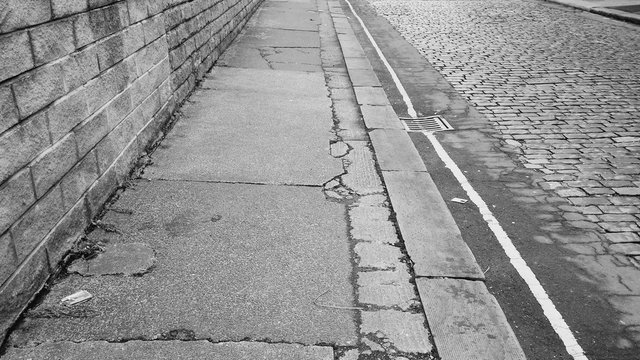 High Angle View Of Sidewalk By Street In City