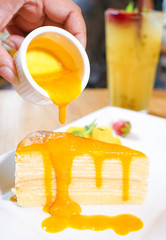 Mango Crepe, Layer Crepe Cake with Topping, served with fruits