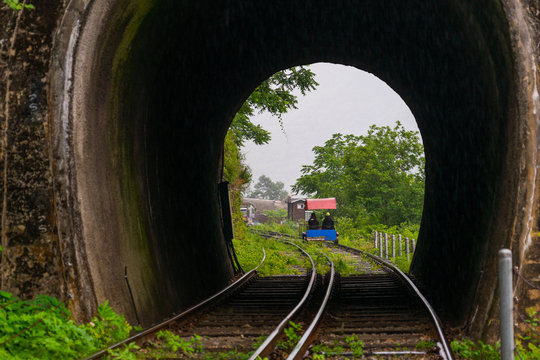 The tourist riding rail bike and enjoy the nature scene while rail bike pass tunnel in Gangchon Rail Park, Chuncheon, South Korea.