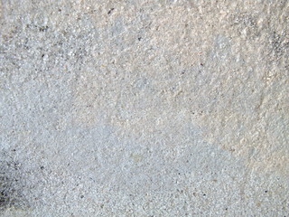 macro photo of old gray white rough rough concrete cement surface